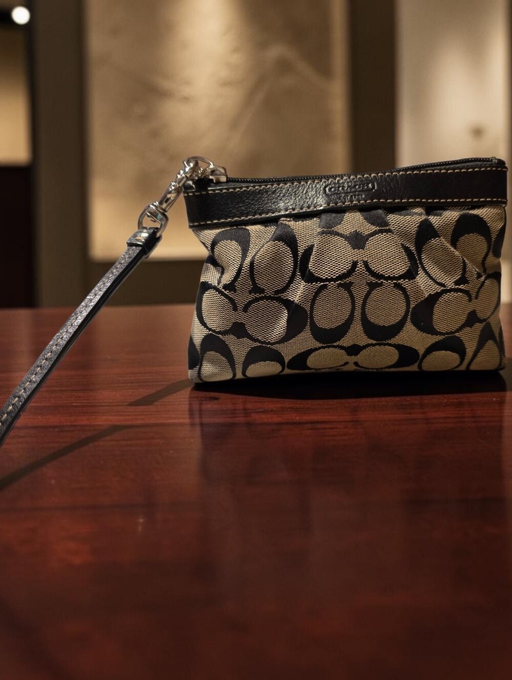 Coach Signature Canvas Wristlet in Black and Tan